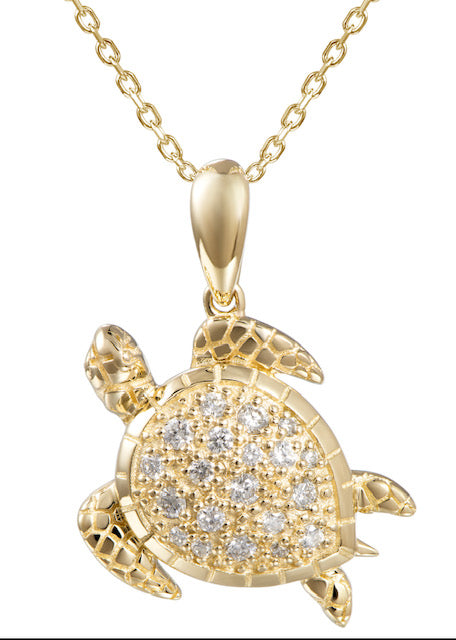 Glimmering and stunning, this beautiful Honu pendant is crafted from 14k yellow gold and features a secure bail and round diamonds totaling 0.17 cts. It measures 22.00 mm in lengthh. An optional 1.1 mm gold chain is available for $199.00.