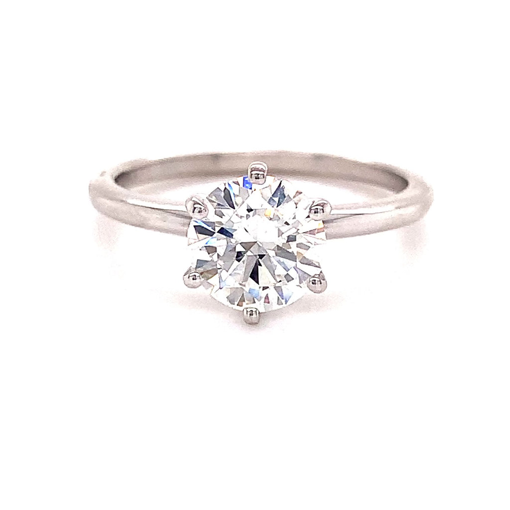 One brilliant solitaire diamond  2.13 cts  Color G/H  Clarity SI-1  Set in 18k white gold mounting   GIA certified   Six prong head