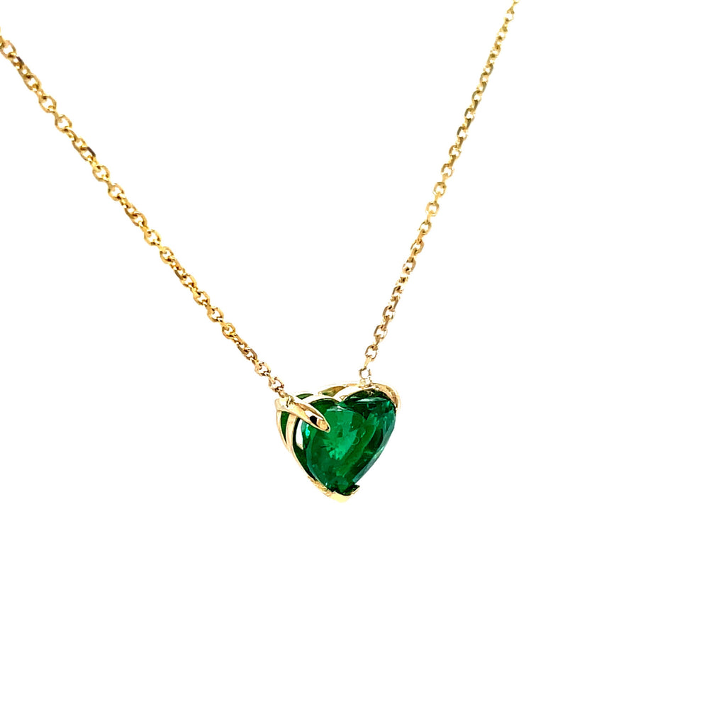 Emerald heart necklace  Perfect for Valentines   From Muzo mines  One heart shape diamond 1.90 cts  14K yellow gold basket setting  18" long.