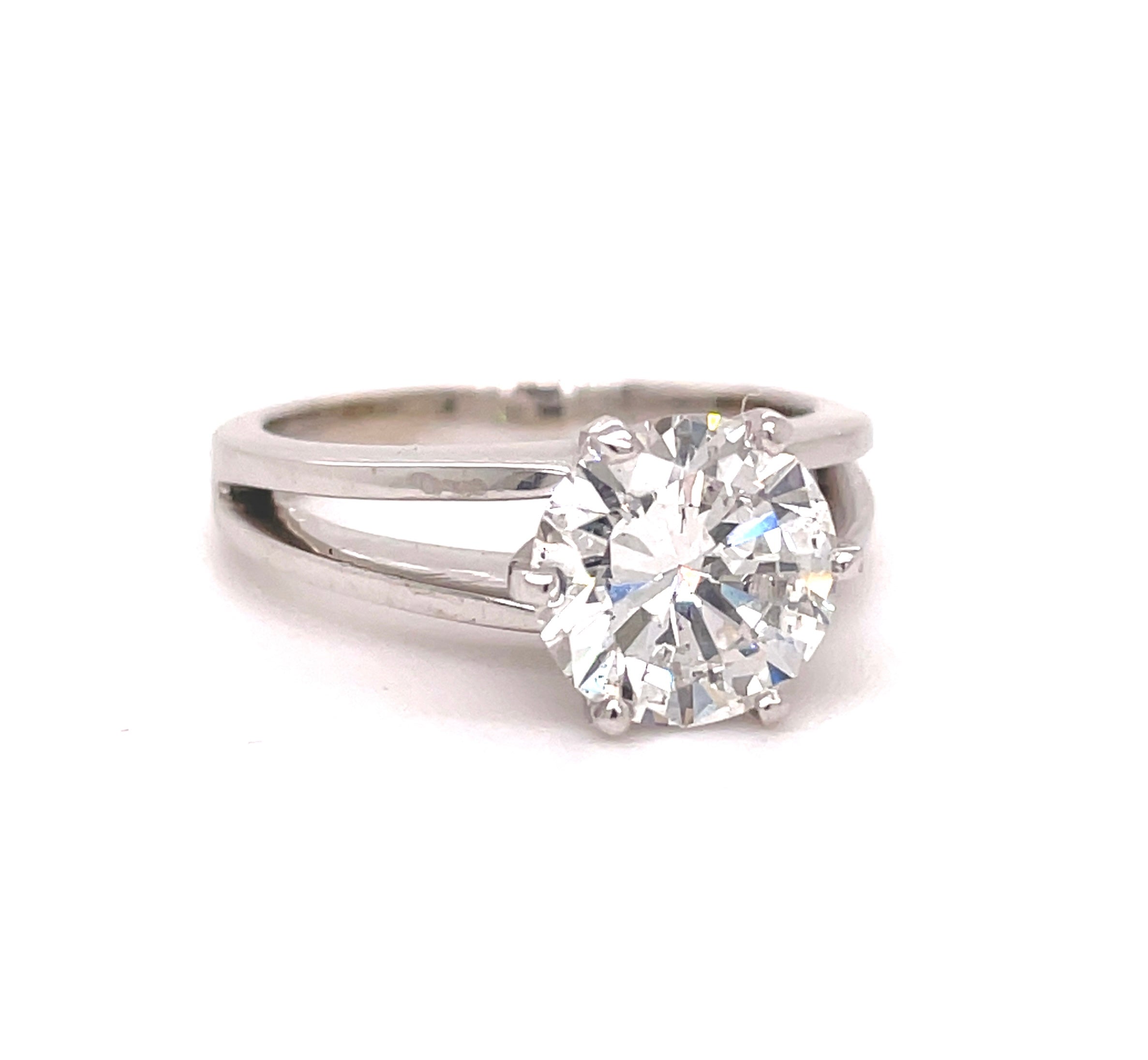 This breathtaking diamond is 2.32 cts, brilliant cut, Color H, Clarity SI1  and is set in an 18k white gold six-pronged split shank, crafted to perfection. It is a sublime & sophisticated addition to your collection.