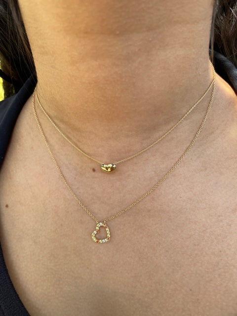 This elegant gold puff heart necklace is crafted in Italy with 14k yellow gold for a timeless look that will last. With its 8.00mm thickness and 2" sizing loops, it's the perfect finishing touch for your favorite outfit.