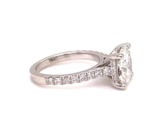 Custom Made Round Cut Engagement Ring with Diamond Band Side view 