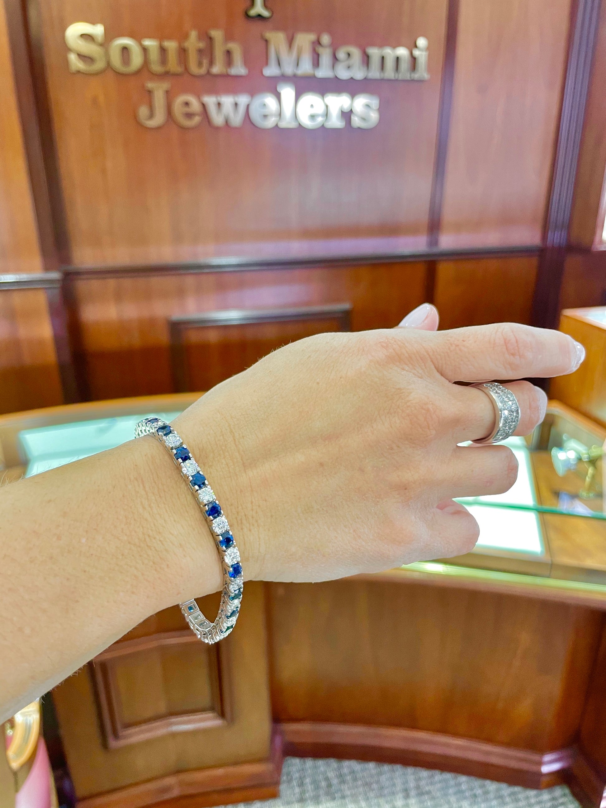 Try on view of 14k White Gold Sapphire & Diamond Line Bracelet