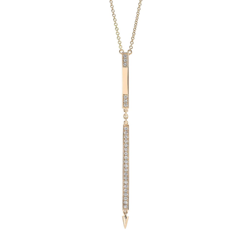 Long bar diamond 2.5" (bar)  Round diamonds 0.26 cts   Set in 14k yellow gold  18" long chain   Secure lobster clasp  The gold spikes on this necklace are directional arrows pointing downward as a call to ground oneself to the fundamentals of life, nature, the divine, destiny, and enlightenment.  