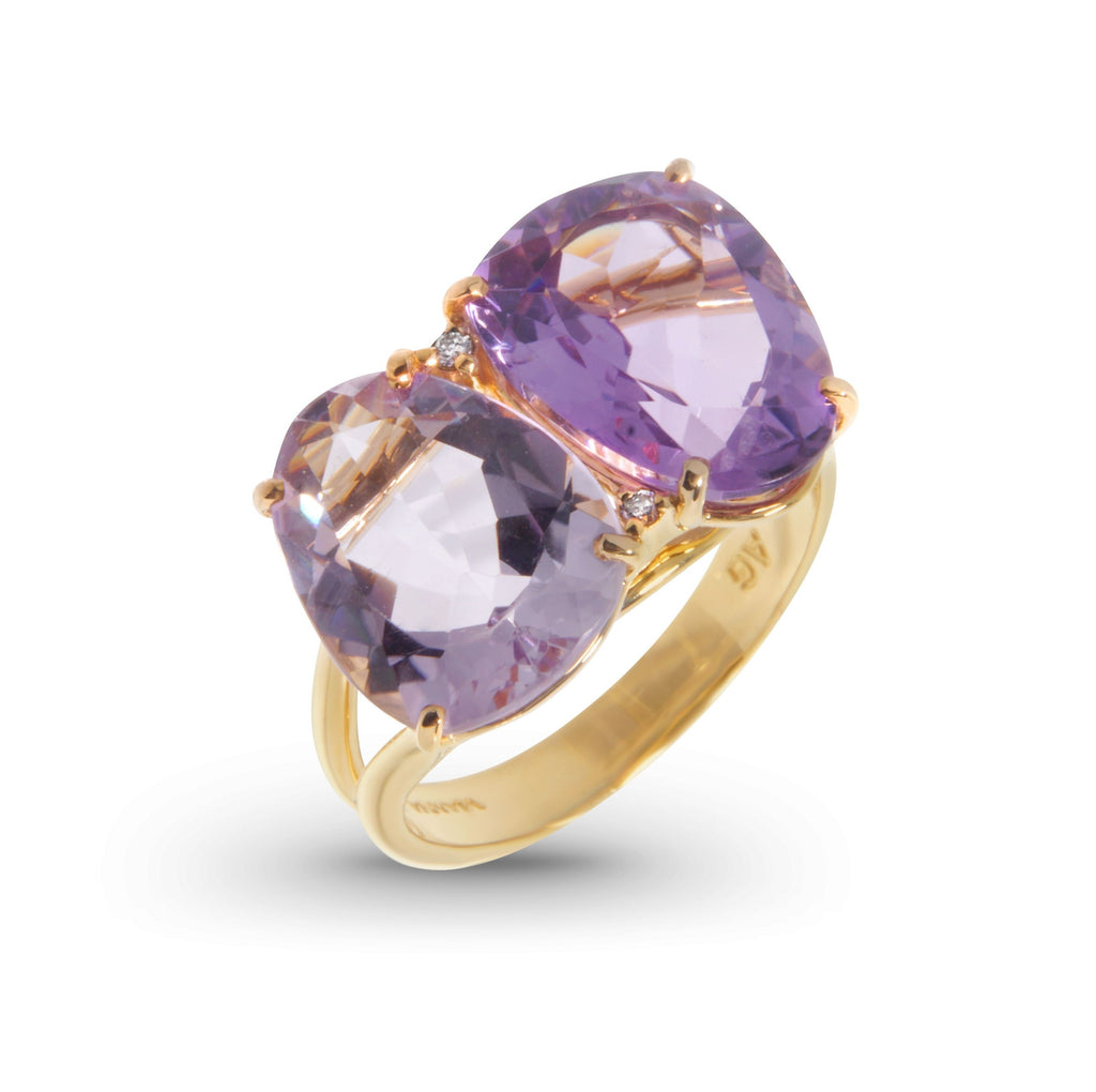 This 20.00 x 13.00 mm captivating ring from our Brazilian collection features two oval cut amethysts (pink and purple) and round diamonds (.02 cts) expertly connected with 18k yellow gold. Its combination of unique cuts and bold colors will bring brilliance and eye-catching style to any outfit. Size 6.5 (sizeable).