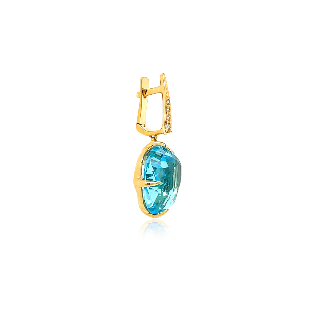 Brazilian-crafted Sugarloaf Collection earrings featuringa tear-shaped, faceted blue topaz weighing 17.00 carats. Accenting the blue topaz are round small diamonds totaling 0.10 carats, all set in eye-catching 18k yellow gold. The earrings feature a secure hinged system. 27.00 mm.