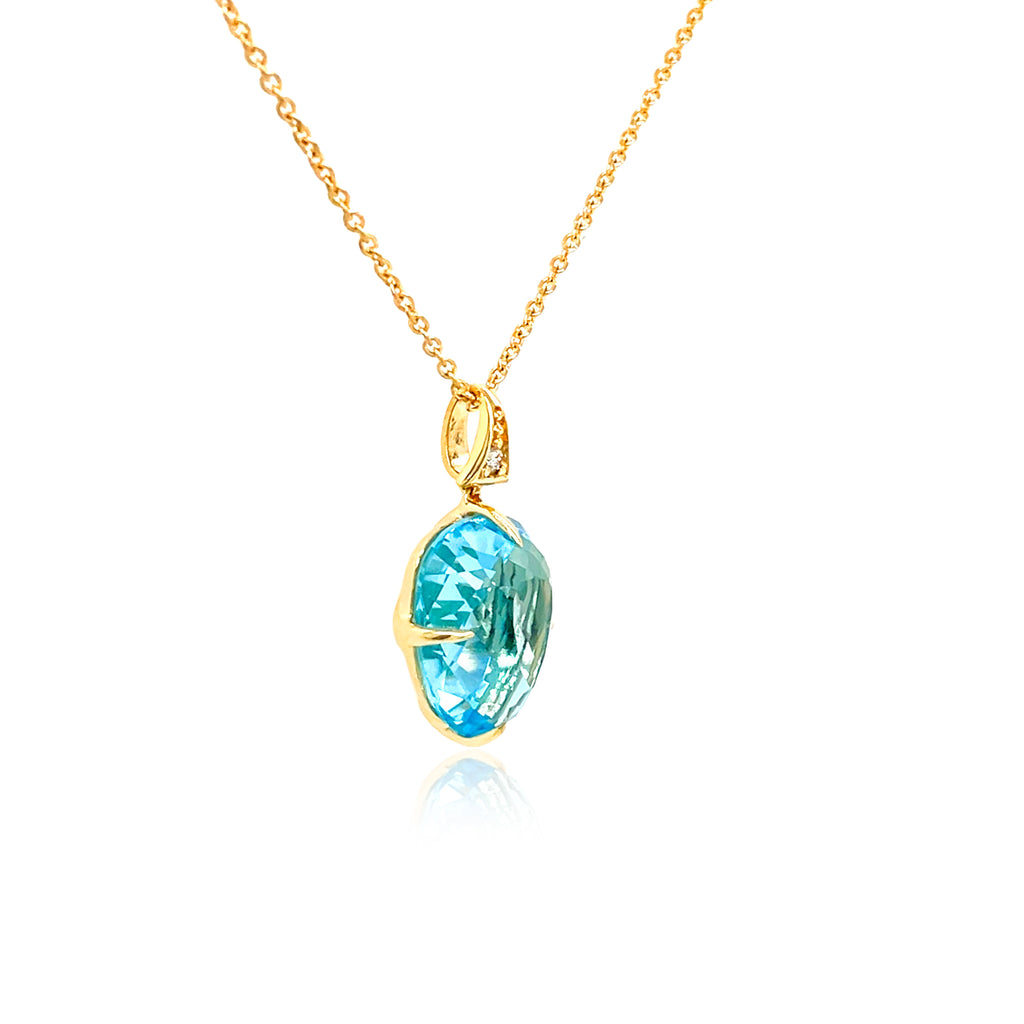 Brazilian-crafted Sugarloaf Collection featuring an 8.60 carat teardrop-faceted Blue Topaz and 0.15 carats of Round Brilliant cut diamonds, all set in 18k yellow gold with a triangular bail. 21.00 mm.