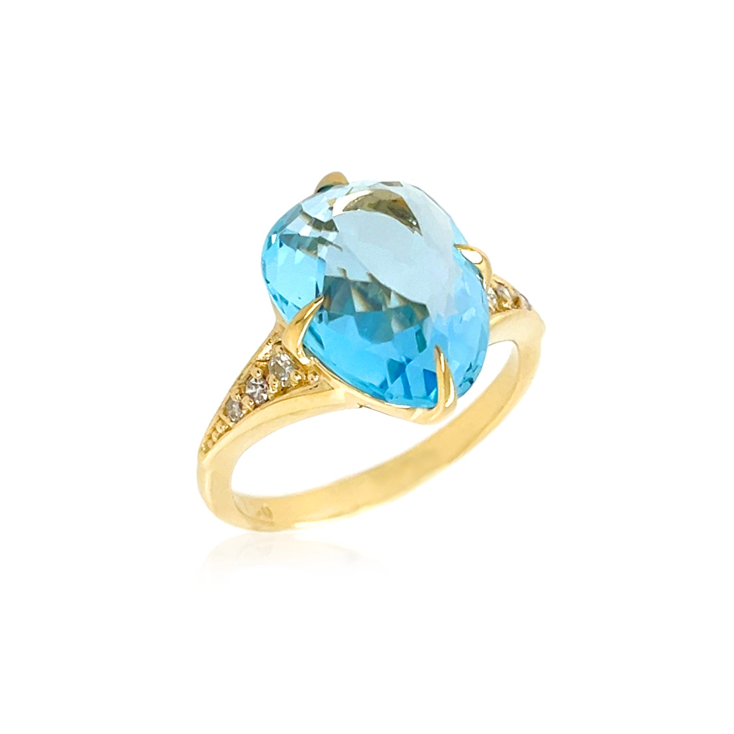 Side view of 18k Yellow Gold Large Blue Topaz & Diamond SugarLoaf Ring