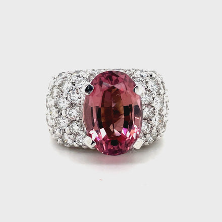 14k white gold  7.0 size (sizable)  Thick & wide ring   Faceted tourmaline 5.21 cts  Oval tourmaline measuring 12.80 mm   Round diamonds 2.00 cts  12.00 mm wide