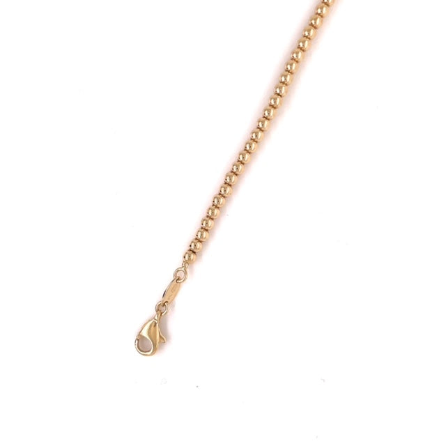 Italian made stackable bracelet   14k yellow gold bracelet  Bead style  Secure lobster.  Small round bar.   7" long