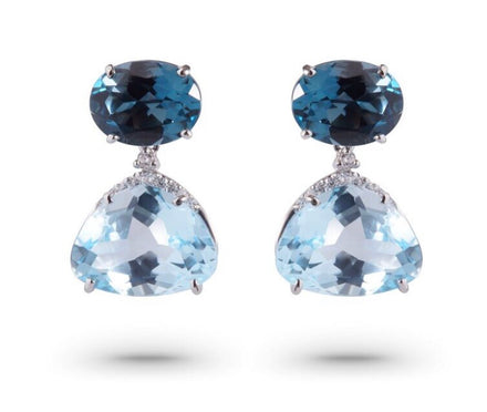 Our Vianna Brasil collection features London Blue Topaz (12.0 cts) and round Diamond (0.11 cts) Drop Earrings in 18K White Gold, measuring 19.88 mm long x 12.00 mm wide with secure friction backing.