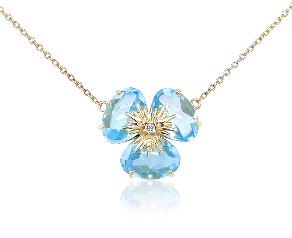Pensée collection made in Brazil  Pensée earrings are inspired in Pansy flowers  Blue Topaz  One small diamond  Set in 18k yellow gold  18" long with sizing loop at 16"  Secure lobster clasp.  17.50 mm flower.