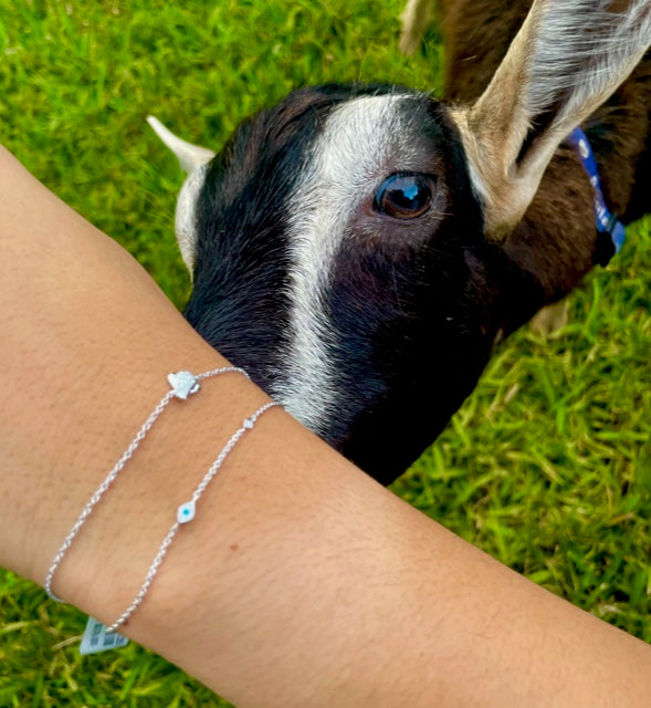 Try on view of One Diamond Evil Eye Bracelet