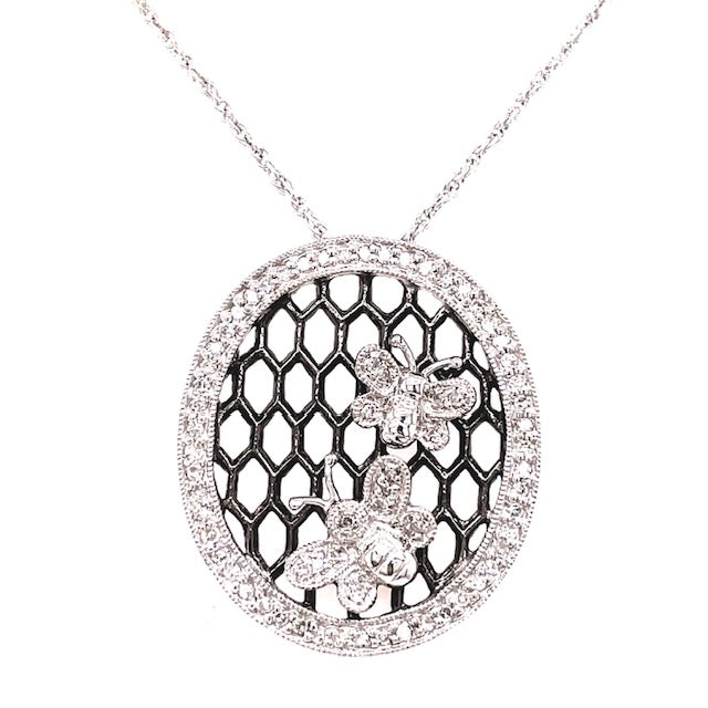14k white gold and 0.32 ct round diamonds adorn two exquisite butterfly shapes set in a mesmerizing black rhodium mesh panel. This beautiful 25.00 mm diamond pendant captures the eye. The optional 16" white gold chain, with secure lobster catch, is $205.00.