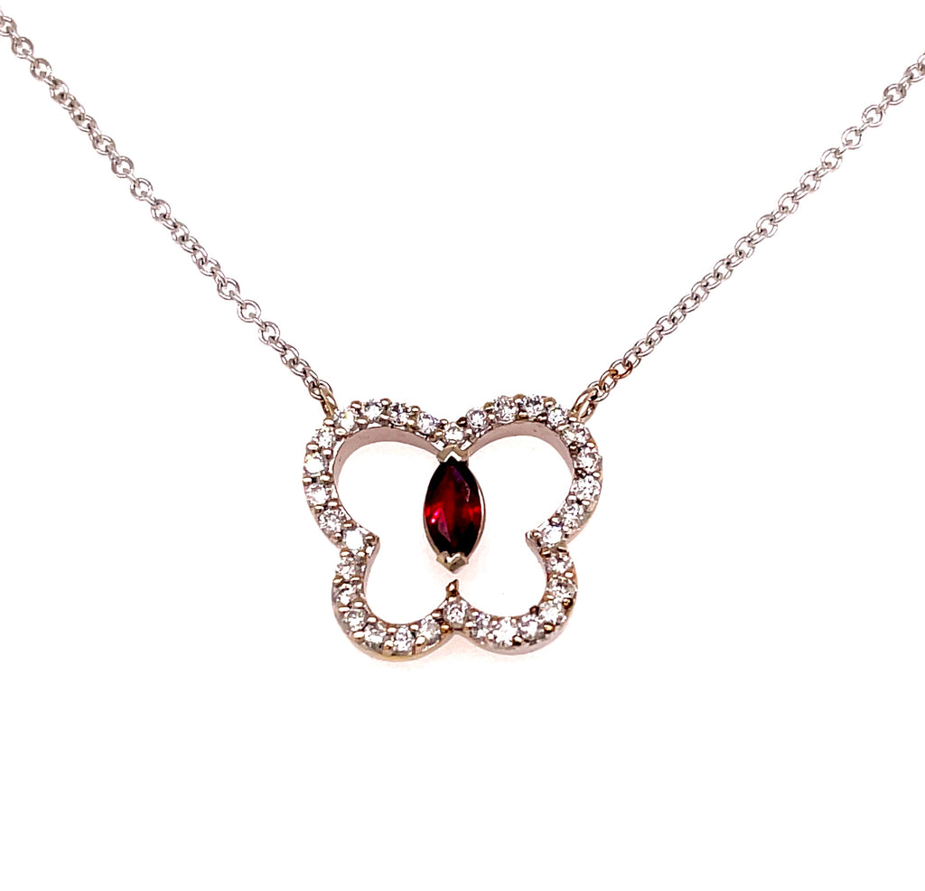 18kt white gold  Cut out butterfly   Round diamond 0.55 cts   14.00 x 15.00 mm   15" long chain   One oval ruby  Secure lobster catch