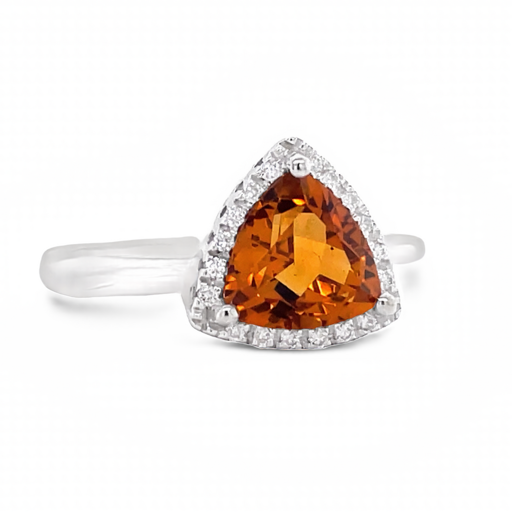 Italian made  Faceted citrine trillion shape 1.62 cts  11.00 x 11.00 mm  Set in 18k white gold mounting  White round diamonds 0.11 cts   Size 6.5 (sizeable).