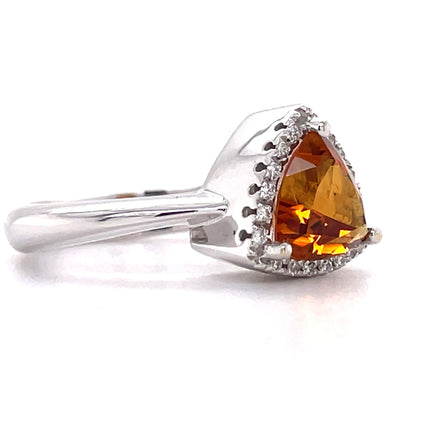 Italian made  Faceted citrine trillion shape 1.62 cts  11.00 x 11.00 mm  Set in 18k white gold mounting  White round diamonds 0.11 cts   Size 6.5 (sizeable).