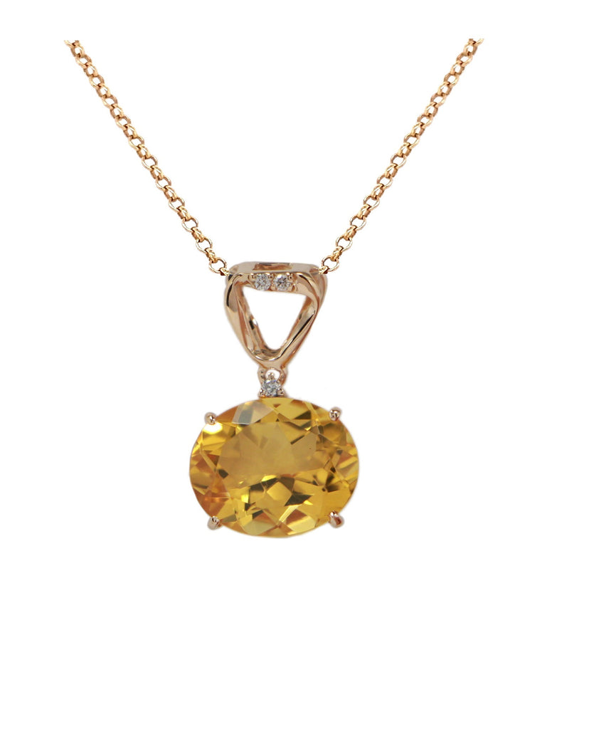 Brazilian oval shape yellow citrine  18k yellow gold basket setting  9.00 mm wide citrine  7.00 long bail  Three small white round diamonds 0.03 cts  16" chain $227 (optional) with secure lobster catch   