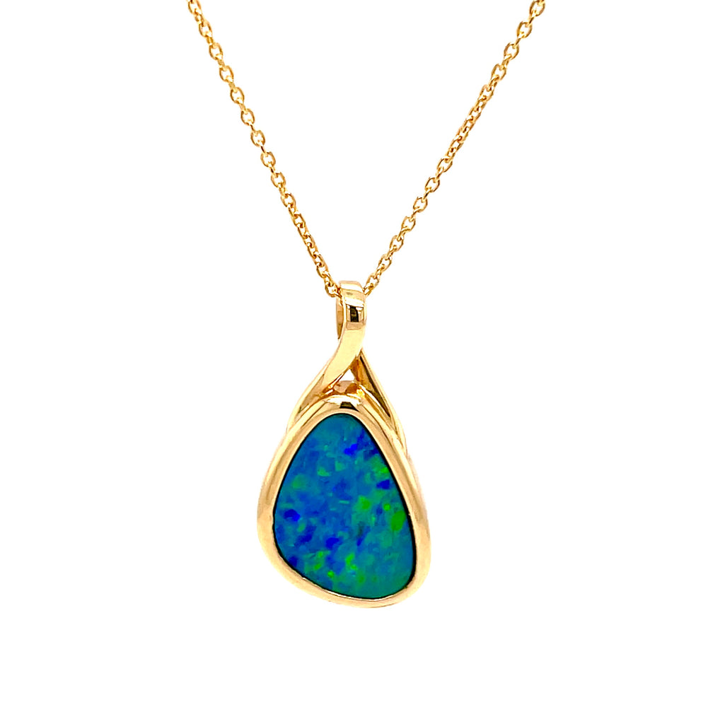 This 14k yellow gold pendant necklace features a 3.30 cts black Australian opal with a great play of color, complete with a 16-inch long yellow gold chain and secure lobster closure.