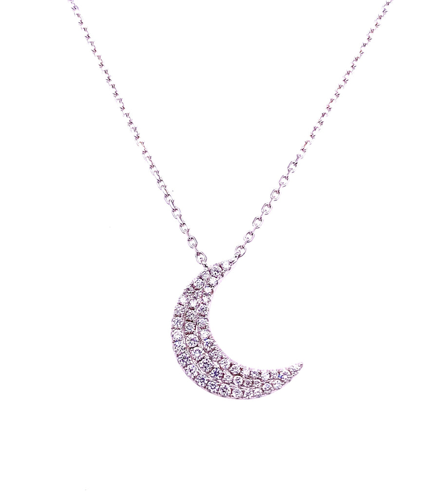 Behold the beauty of this 0.29 cts diamond crescent moon pendant, set in 18K white gold. Securely attached to an 18" chain with a sizing loop at 16", this stunning piece will adorn you with elegance and grace.