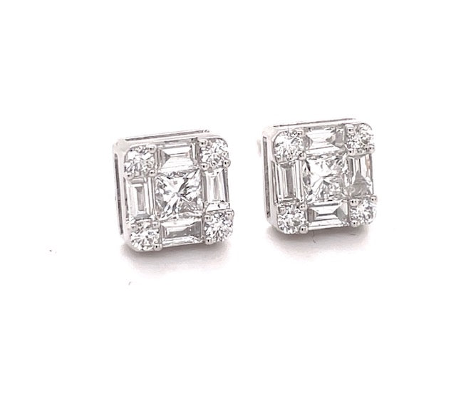 Extremely well made  High quality diamonds   Set in 18k white gold  Mixed fancy cut diamonds 1.06 cts (baguettes & rounds)  Color F/G  Clarity VS1  Secure friction backs.  7.56 mm wide