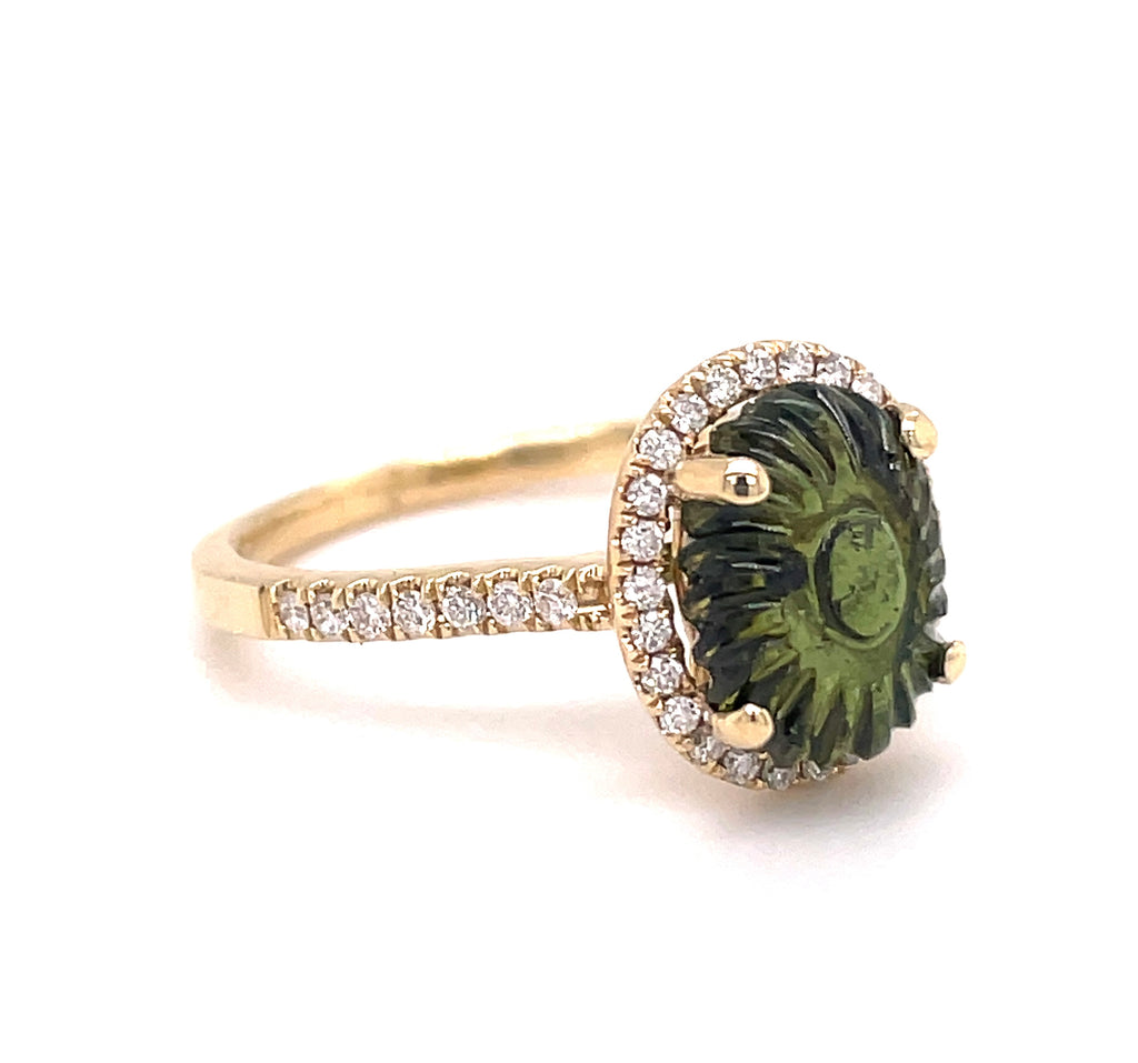 14k yellow gold  Surrounded by white round diamonds 0.45 cts   Size 6.5  Round green tourmaline  11.00 mm