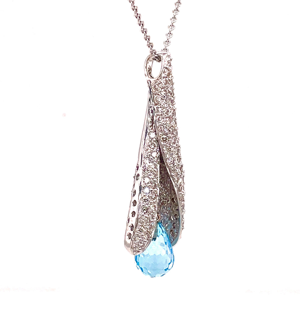 This elegant pendant necklace features a briolette-cut blue topaz, round 1.53 cts diamonds set in 18 karat white gold, with a 14 karat white gold chain link and secure lobster clasp measuring 16 inches in length.