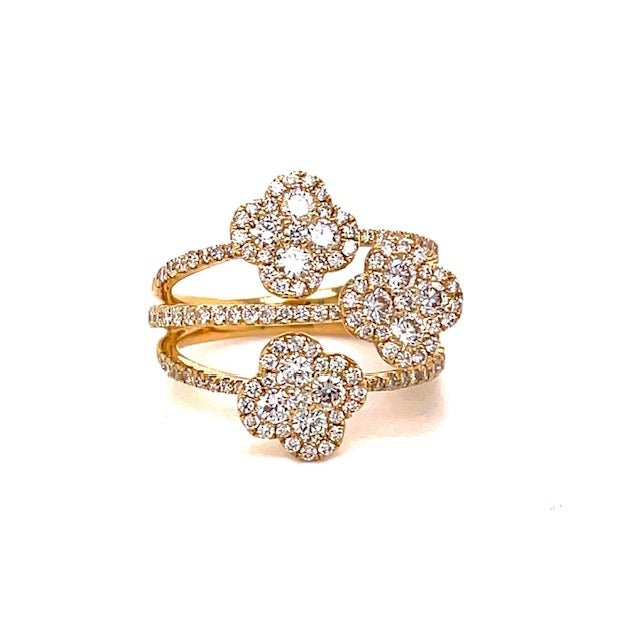 Set in 18k yellow gold  7 size  9.00 mm each clover  19.00 mm total width  Three diamond rows  1.44 cts diamonds   Color F/G  Clarity VS1