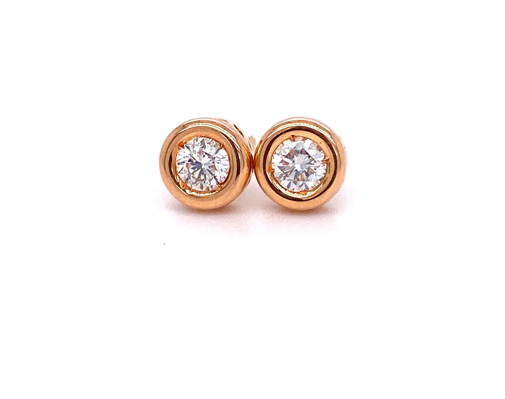 Diamond bezel stud earrings 18k rose gold  Secure friction backs   White round diamonds 0.36 cts  Gallery design on the side of the earring