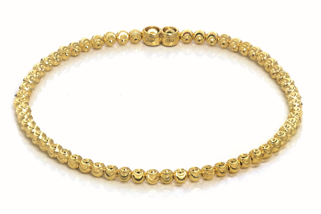 Italian collection from Officina Bernardi  High precision diamond cut 5.00 mm bead  Gold plated  Flexible and stretchable.