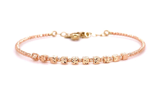 Front view of fastened 14k Rose Gold Gold Diamond Cut Bangle