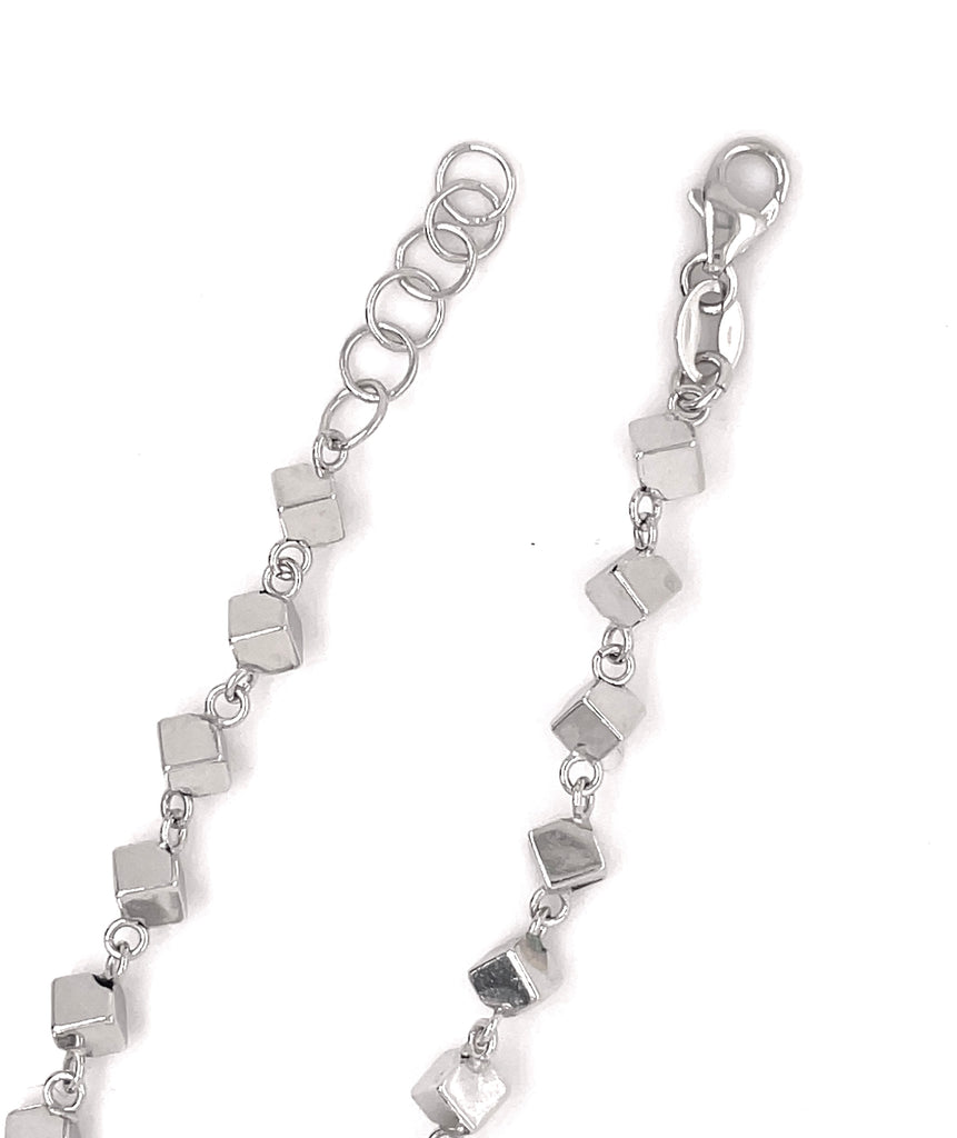 This classic design is crafted from 14k Italian White Gold and features small squares. The secure lobster closure and sizing loops make this bracelet a perfect fit - measuring up to 7" in length and 4.30mm in width.