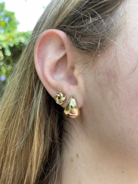 14k yellow gold.  Italian made  Stud earrings                           Secure friction back  8.00 mm.