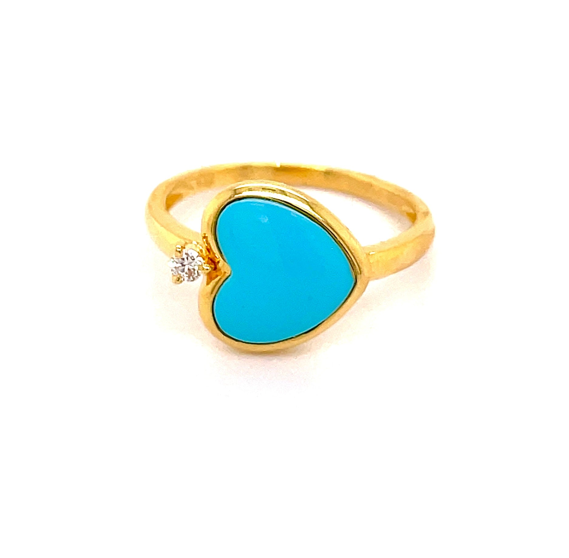 14k yellow gold  Heart shape turquoise   Size 6.5  One small diamond 0.04 cts  12.00 mm.