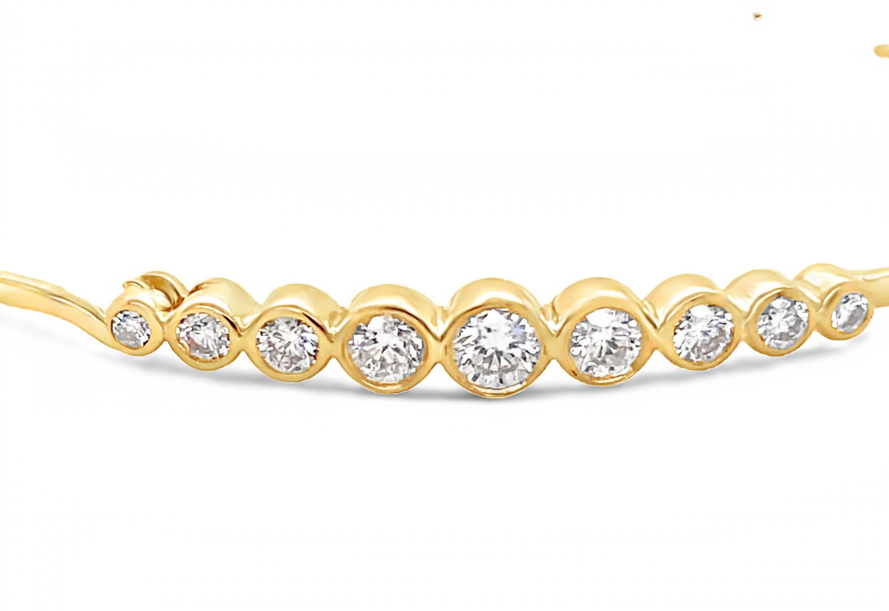 Dainty diamond bracelet 0.64 cts  9 round diamonds   14k Yellow Gold  Opens at fornt  You can stack it or wear it alone 