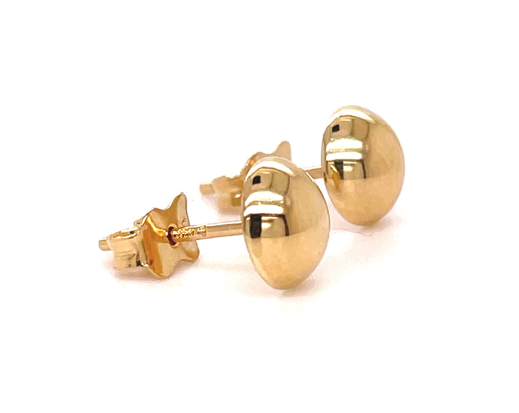 These earrings offer long-lasting wear thanks to their secure friction back findings and Italian-made craftsmanship. Their classic half ball design is stylish in luxurious 14k yellow gold.