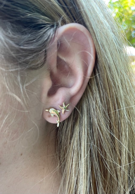 Try on view of 14k Yellow Gold Diamond Dolphin Earrings