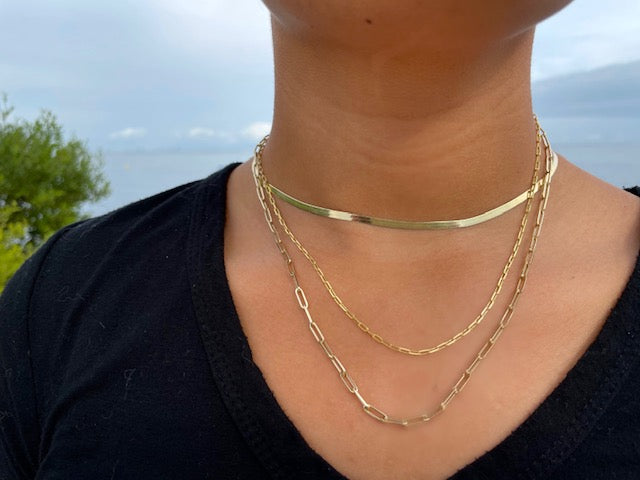 Try on view of 14K Yellow Gold Paperclip Link Light Necklace 16"