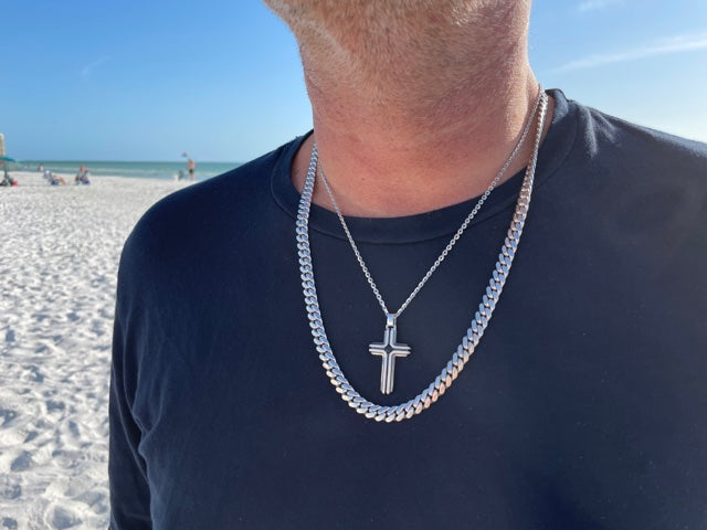 Italian made men chain  925 sterling silver  Rhodium coated  Secure lobster catch with black spinel stone  24" long.  Cuban link 6.80mm wide