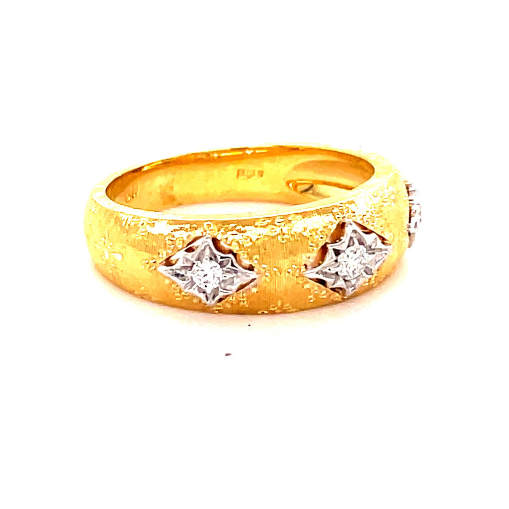 18k yellow gold.  Italian made.  Engraved  7.00 mm wide.  Size 6.5  Three round diamonds 0.11 cts   Brushed finished.
