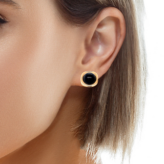 Try on view of 14K Yellow Gold Onyx Cabochon Yellow Gold Stud Earrings