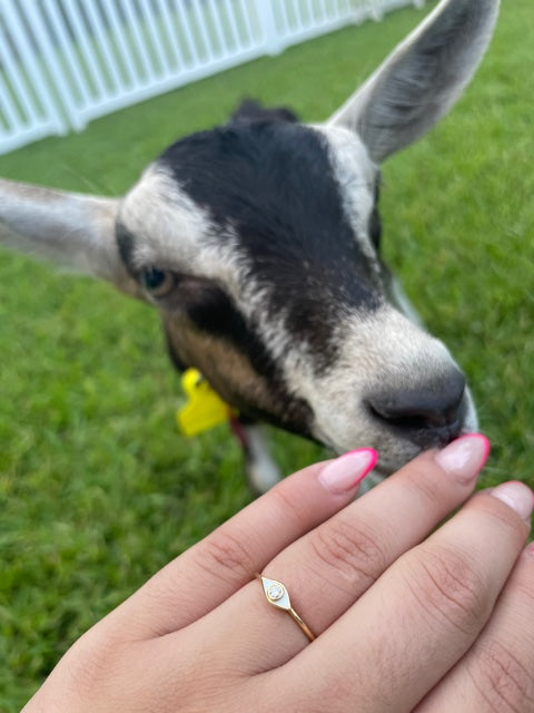 Try on view of 18k Evil eye diamond ring