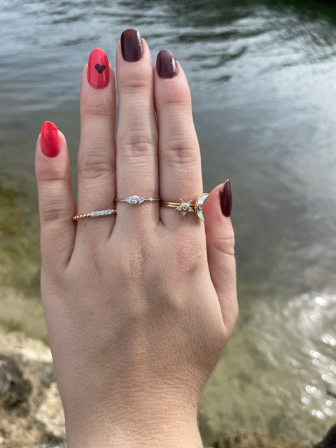 Try on view of 18K Evil Eye Diamond White Gold Ring