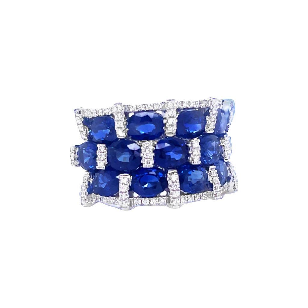 14k white gold ring  Oval sapphires 5.36 cts  Round diamonds 0.32cts.  Wide ring   15.00 mm.  F color  VS1 clarity
