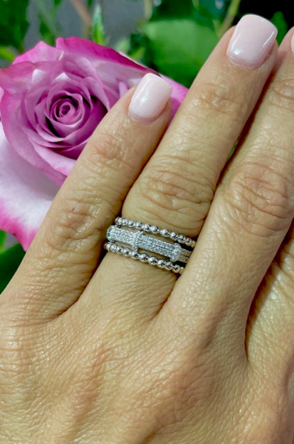Everyday gold rings that are easy to stack.  Set in 14k white gold mounting.  Size 6 (sizeable)
