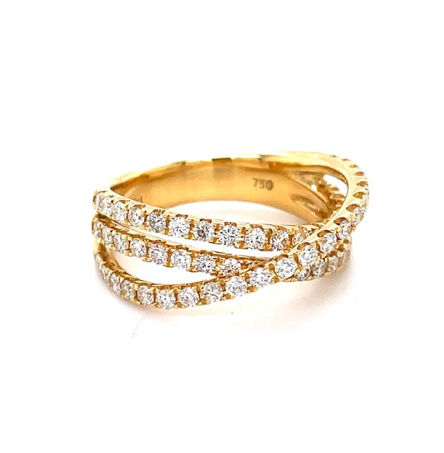 A stunning cross over fashion ring features 18k yellow gold and 0.91 cts of F/G-colored diamonds of VS1 clarity. This ring will captivate all who set eyes on it.