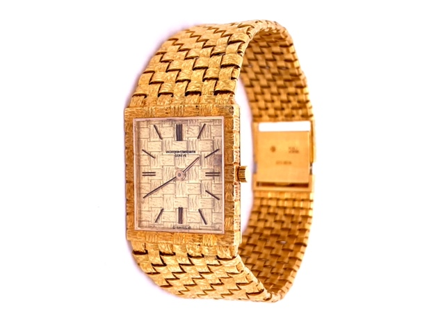 Gold hour markers  Gold dial   18k yellow basket pattern integrated bracelet with clasp  Good working condition  Automatic watch